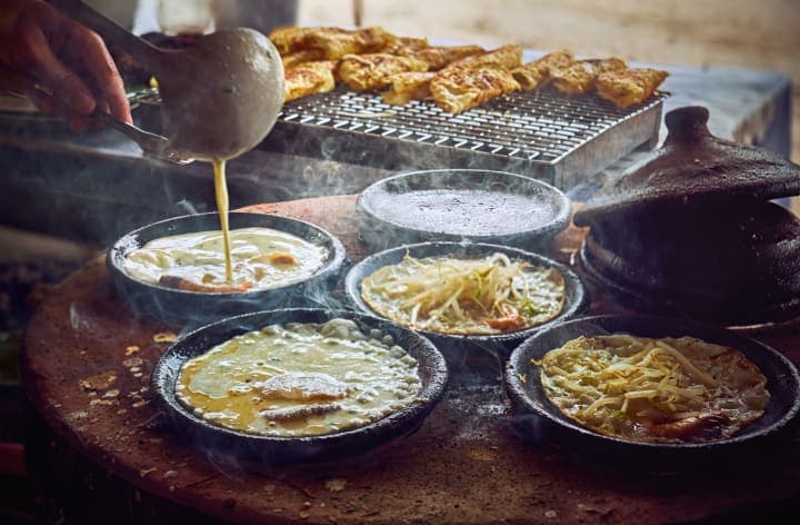 Streetfood- & Scootertour zu den Highlights von Ho-Chi-Minh-Stadt thumbnail